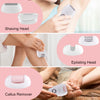 A collection of three white electric hair removal heads including a shaving head, epilating head, and callus remover.