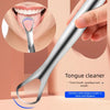 A hand holds a stainless steel U-shaped tongue scraper, demonstrating its use for oral hygiene.