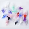 Una colección de tapones para los oídos de silicona en varios colores pastel, incluyendo morado, verde, rosa y azul.