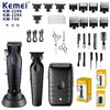 A collection of professional electric hair clipper grooming tools and accessories in black and silver.