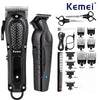 A black Kemei cordless hair clipper and scissors set with various guard attachments.