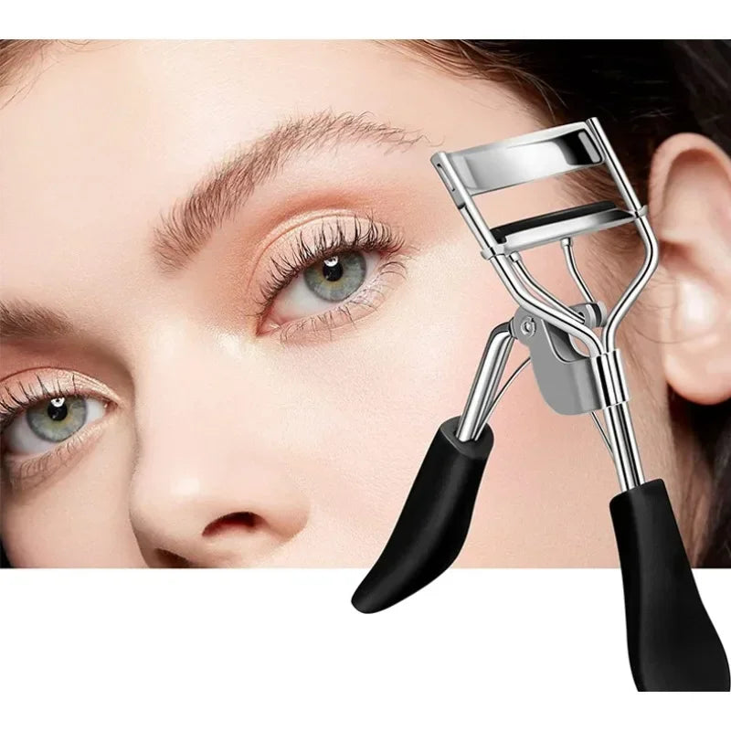 A close-up of a woman's eye being curled by a silver silicone eyelash curler tool.