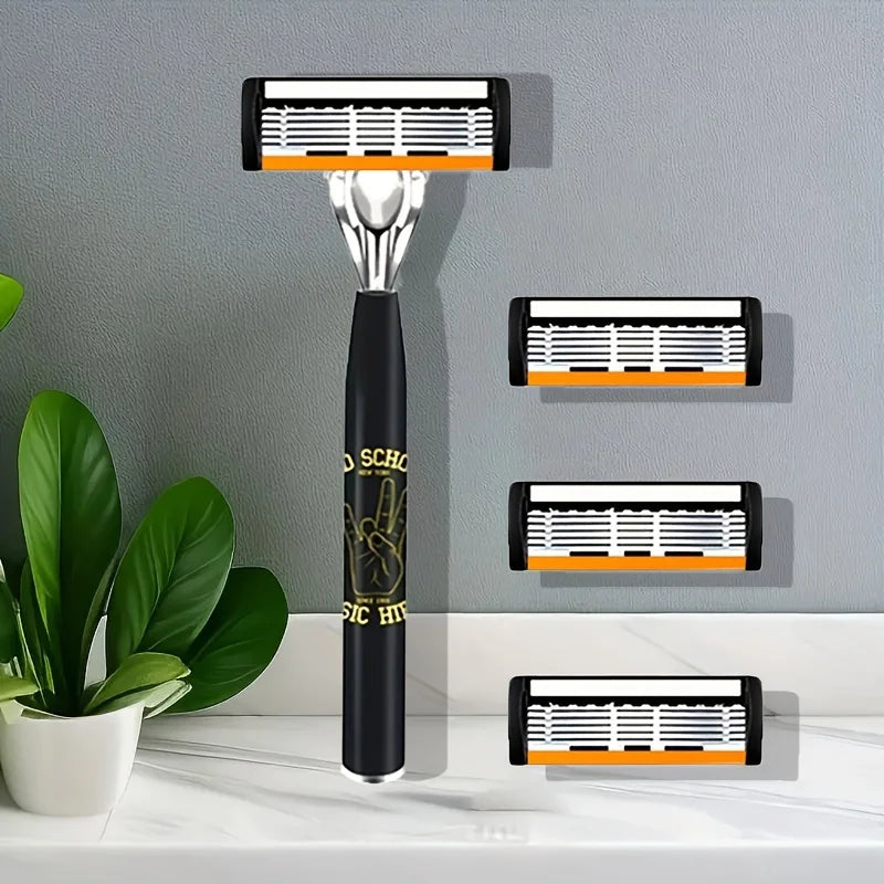 A black safety razor with an orange handle and a silver head is displayed on a white countertop.