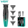 A set of VGR professional cordless hair trimmers in black and green packaging.