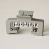 A matte gray non-slip hat claw clip with multiple gripping teeth for securing baseball caps.
