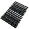 A tray of mixed black false eyelashes displayed on a white background.