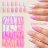 A box of 288 press-on nails in various shades of pink and purple displayed on a hand.