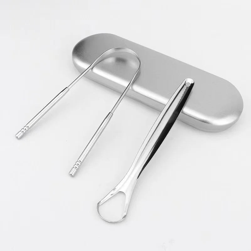 Stainless steel U-shaped tongue scraper resting on a silver rectangular surface.