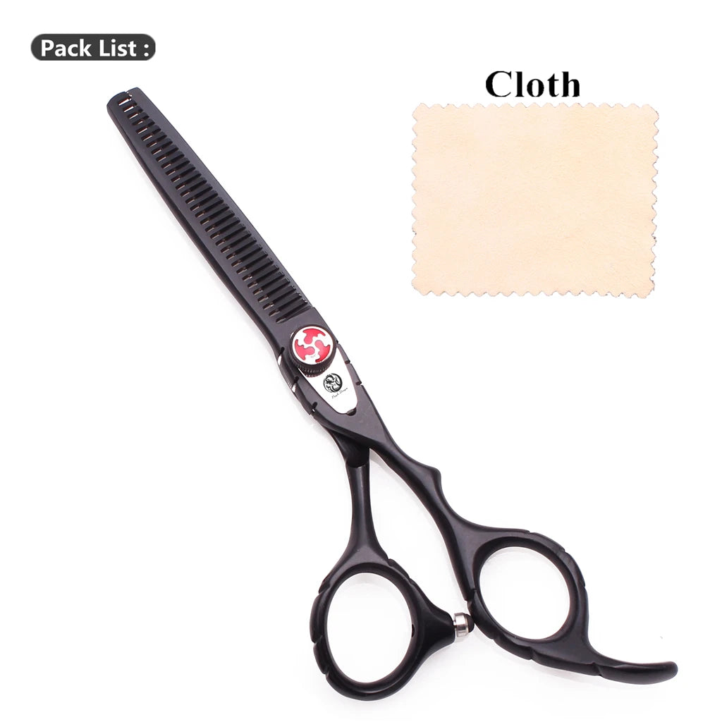Un par de tijeras de cortar cabello profesionales de acero inoxidable negro y un trozo de tela.