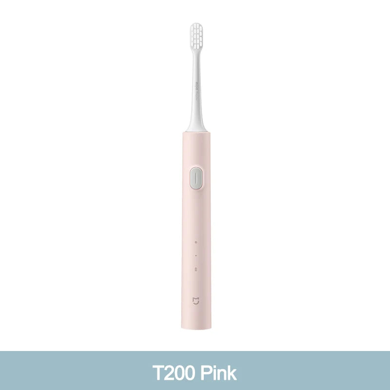 A pink sonic electric toothbrush with a white handle and brush head.