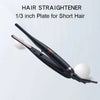 A black hair straightener with a 1/3 inch plate is shown against a white background.