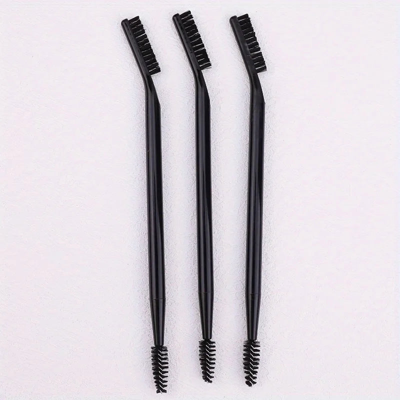 A set of three black dual-ended eyelash curlers and a brow brush displayed vertically on a white background.