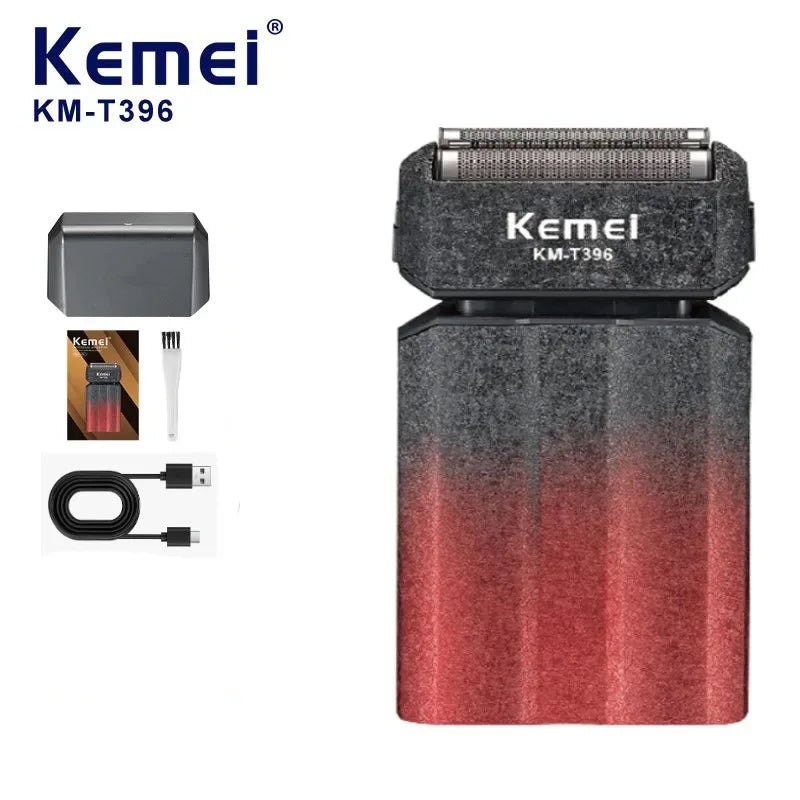 A Kemel KM-T396 electric foil shaver with a dark gray body and red accents, shown next to its accessories.