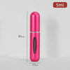 Flacon de parfum rose rechargeable avec pompe argentée, présenté debout.