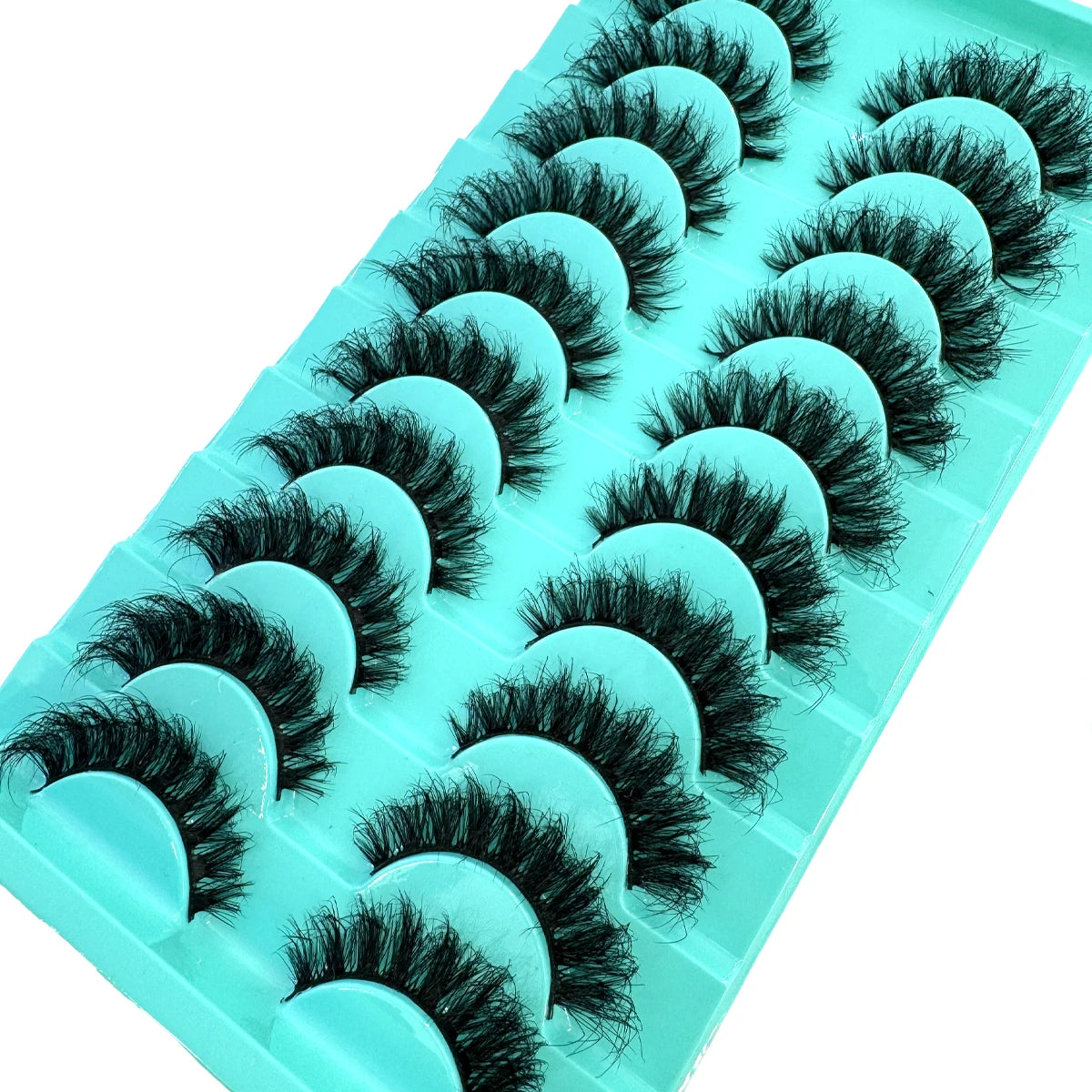 A plastic tray holding ten pairs of black false mink eyelashes.