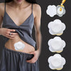 A woman shows disposable castor oil adhesive belly button patches, including various sizes and colors, on her abdomen.