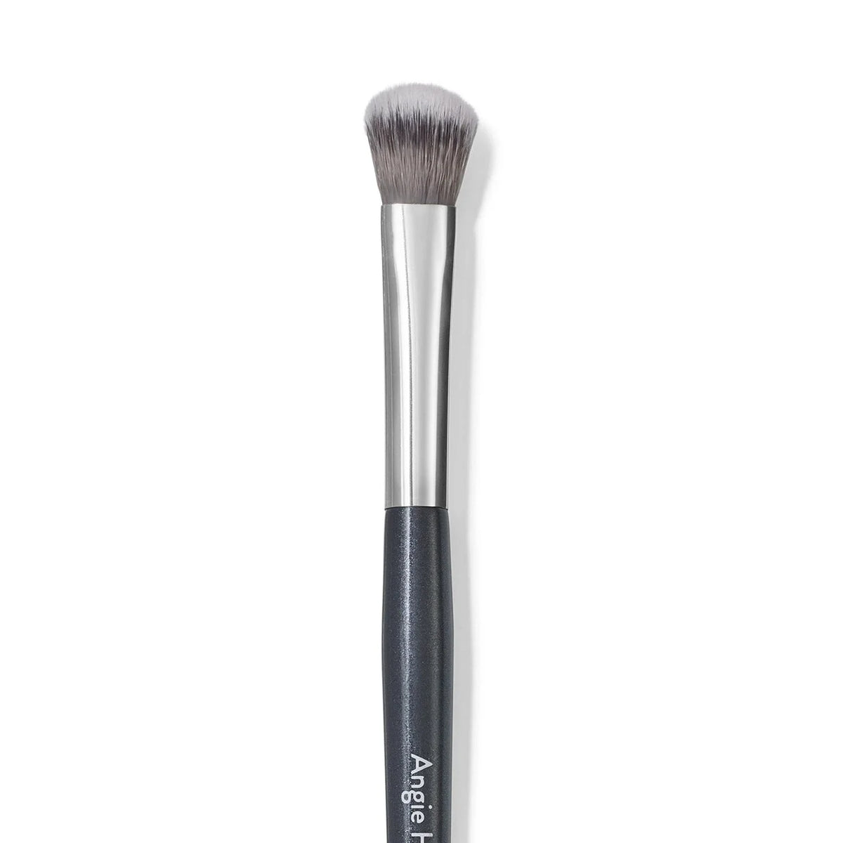 A precision concealer brush with a gray synthetic hair and black handle.