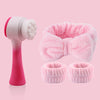 Set de cepillo facial de silicona rosa con mango y varias cabezas de cepillo.