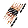 A set of professional double-ended nail art brushes with gold and black handles arranged diagonally.