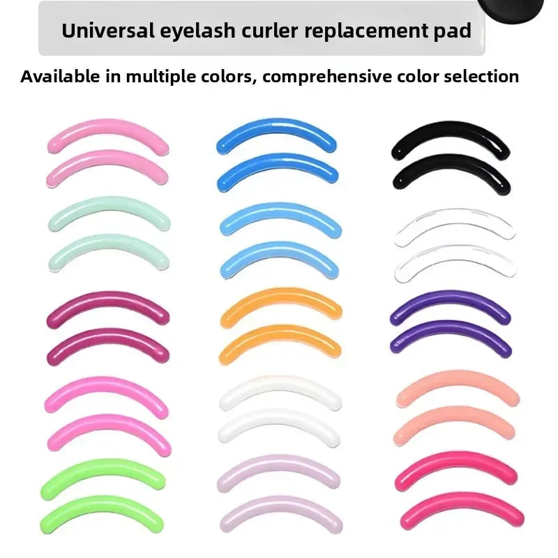A collection of reusable silicone eyelash curler replacement pads in various colors and shapes.