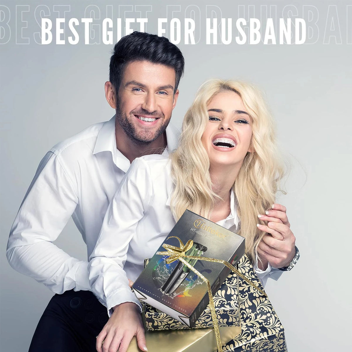 A smiling couple holds a gift box of a cordless beard trimmer for men.