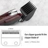 A close-up of a black hair clipper blade and its corresponding precision cutting guard on a red body.