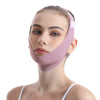 A woman wearing a pink adjustable facial lifting strap for contour definition.