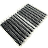 A tray of mixed false eyelashes showing various lengths and styles for natural eye enhancement.