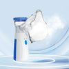 A white and blue 2-in-1 facial steamer and humidifier device is shown emitting a cloud of steam.