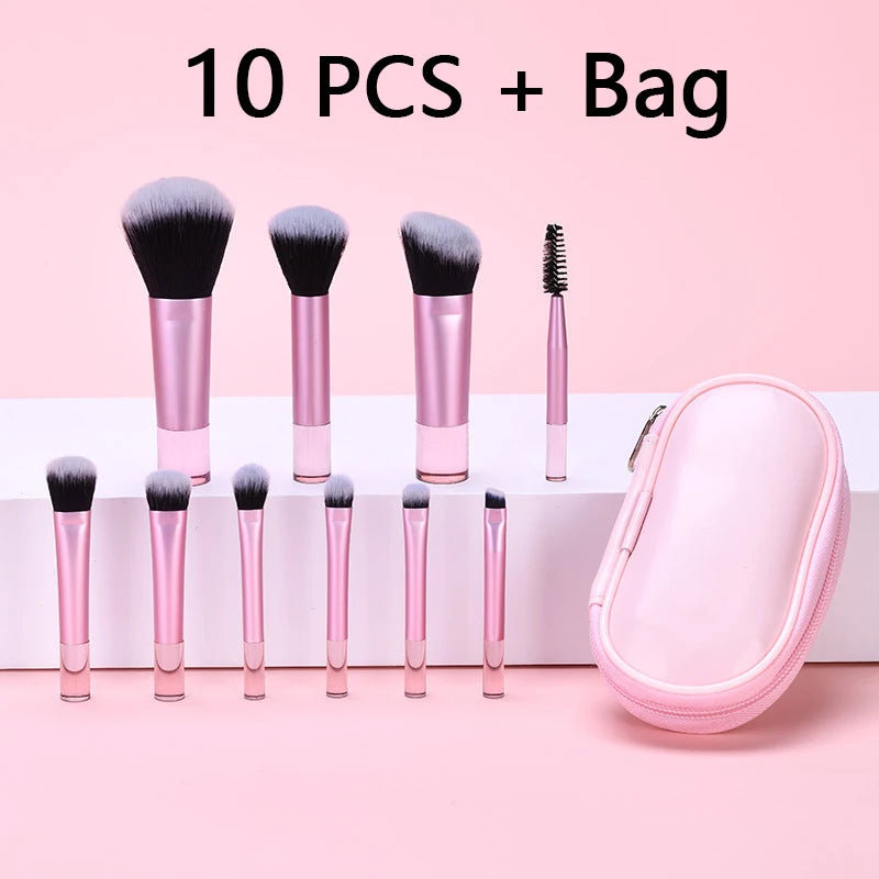 A set of ten pink makeup brushes and a bag displayed on a pink background.