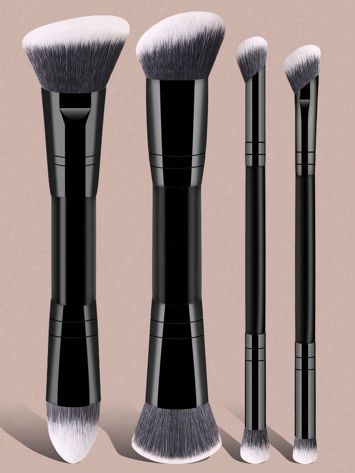 A set of six black makeup brushes with silver ferrule and white hair, shown standing upright.