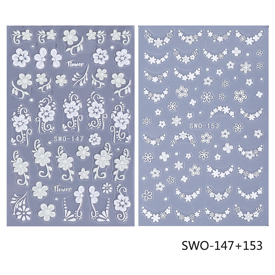 Two sheets of embossed white floral nail stickers featuring various flower and leaf designs.