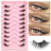 A pink plastic tray holding multiple pairs of clear band cat eye false eyelashes and a loose lash bundle.