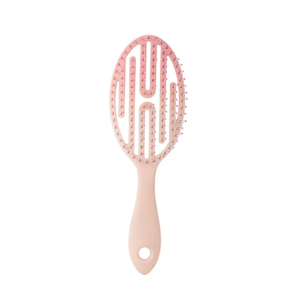 Peigne de coiffure rose avec poils souples pour soins capillaires mouillés et secs.