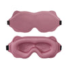 A pair of pink 3D sleeping eye masks shown from the front.
