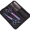 A black case holding a pair of professional stainless steel hairdressing scissors and a comb.