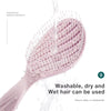 A pink hollow-out detangling hair brush with bristles is shown, emphasizing its perfect texture.
