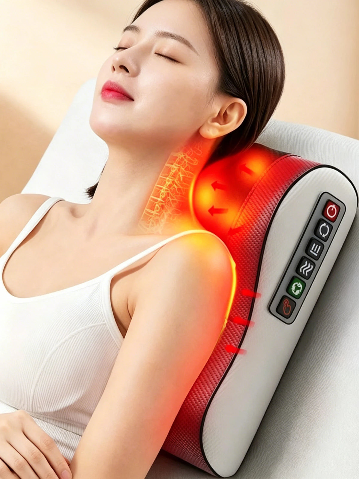 A woman is receiving a deep kneading massage with soothing heat from a red and white pillow device.