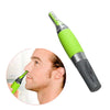 A close-up view of a green and black rechargeable nose and ear hair trimmer device.