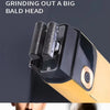 Close-up of a trapezoidal reciprocating steel razor grinding out a big bald head on a shaving device.