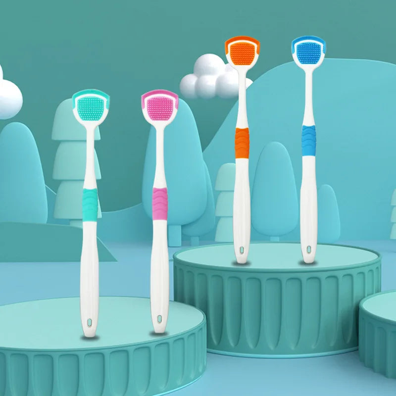 A collection of five reusable stainless steel tongue scrapers in various colors displayed on a light blue background.