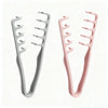 A pair of light gray and pink volumizing wide-tooth hair styling combs.