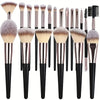A set of various makeup brushes including foundation, powder, and blending brushes.