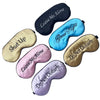 A collection of five embroidered silk sleep masks with various phrases like Leave Me Alone Good Night Shut Up and Do Not Dist