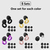 A collection of black and gold reusable ear plugs in various sizes and colors, packaged in five sets.