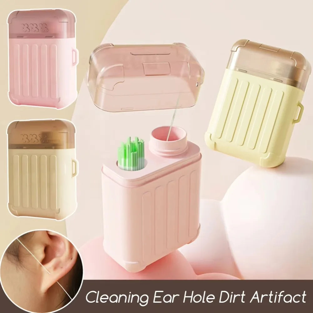 Un ensemble d'objets jetables rose et beige pour nettoyer les trous d'oreille et les piercings.
