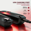 A black rechargeable hair clipper trimmer with a USB charging port is shown on a red surface.