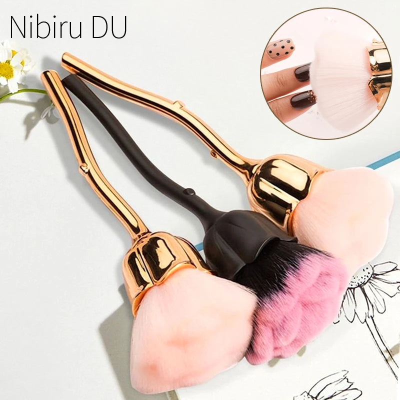 A set of gold and black dust brushes for nail art, featuring soft pink and magenta bristles.