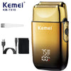 ماكينة حلاقة شعر لاسلكية ذهبية وسوداء Kemei KM-TX10 مع واقي أبيض وقبلة شحن قابلة للفصل.