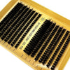 A box of volume lash clusters for DIY eyelash extensions, showing natural black lashes and measuring guides.